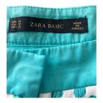 ZARA BASIC-TEAL & WHITE SHORTS-SIZE MEDIUM Gorgeous super lightweight shorts, teal and white, has front pleats and pockets, excellent condition Measurements: Waist: side to side 16 1/2 inches Rise: 10 inches Inseam: 3 inches Photo 3