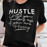 “HUSTLE UNTIL YOUR HATERS ASK IF YOU'RE HIRING” BLACK T Photo 1