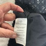 Rip Curl  Black Crossbody Bag with Fringe Accents Photo 6