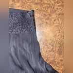 Black knee length skirt with sequin waistband and sheer overlay Photo 1