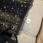 Sabrina Carpenter Black Rhinestone Heart Cut Photo 7