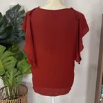 Mossimo Supply Co Massimo Embroidered Blouse top with tassel tie details terracotta Photo 1