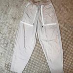 Nike Womens XS Pants Medium High Rise Wind Jogger Loose Sherpa Trim Tan NWT Photo 0