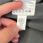 Old Navy Herringbone Heather Gray Fleece Lined Puffer Vest. Like new. Fleece lined pockets. Collar can be worn up or down. Very warm.  24.5” long 17.5” bust approximately Photo 7