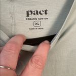 Pact women’s long sleeve front pocket Tee. Size extra large. Mint green. Photo 1