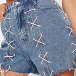 Missguided blue lace up denim shorts Photo 2