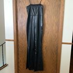 Pretty Little Thing  black strappy split hem flare jumpsuit‎ Photo 4