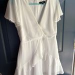 Lulus White v-neck dress from Lulu’s, perfect for graduation or bridal activities  Photo 0
