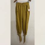 Free People NWT Fp Movement  Circle Back Tie Hem Cropped Jogger Pants burnt gold Photo 1