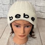 Bebe women OS Winter beanie and scarf set white w/black writing Photo 0