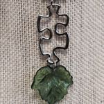 Puzzle Piece Green Leaf Necklace Photo 4