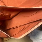 Stylish Women's Athletic Shorts in Rust by Nike Orange Size L Photo 4