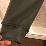 Strut this  Dark Green Cropped Sweatshirt Photo 3