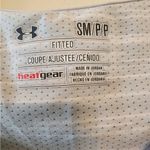Under Armour  heat gear fitted black grey shirt size womens small Photo 1