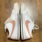 Nike Women's White and Peach Sneakers Photo 1