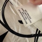 White House | Black Market  Black and White Floral 100% Silk Pleated Knee Skirt Photo 5