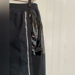 Nike  Sportwear Icon Clash Pants in Black Zippered Leg Pocket Detail Size M Photo 10