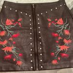 Embroidered faux leather black zip front floral mini skirt size Medium Photo 5