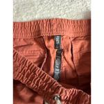 Vuori  Orange Ripstop Shorts Size XL Photo 1