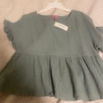 Francesca's NWT francesca’s green top Photo 0