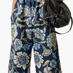 Free People Bali Albright Smocked Cut Out Wide Leg Jumpsuit in Navy Combo Photo 0