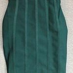 Medium dark green body con type dress with ruffled bottom Photo 0
