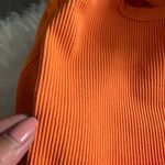 Free People Happiness Runs Convertible Tank in Orange Photo 4