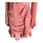 EXPRESS -FAUX WRAP MINI DRESS-SIZE XS V neck, faux wrap front, long sheer sleeves, ruched skirt with ruffles down the side, tiered ruffle hem, metallic fit fabric, fully lined except for sleeves, excellent condition, like new Measurements: Bust: armpit to armpit 16 1/2 inches Waist: side to side 13 inches Length: shoulder seam to bottom 32 inches Photo 7