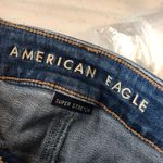 American Eagle  Distressed Hi-Rise Mini Skirt Super Stretch Denim Blue Size 00 Photo 2