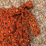 Urban Outfitters heart print, bow tie side, ruffle mini skirt Photo 5