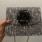 Camellia Black Tweed Clutch with Floral Accent Photo 7