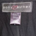 Polly & Esther Boutique purchase from Nashville, TN. Lace up front. Flows, high low hem. Photo 5