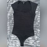 Body Contour Black Bodysuit!
Body contour and stretchy material Size XS Photo 4