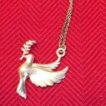 Bird gold colored charm Photo 0