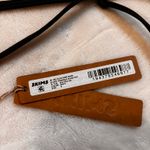 SKIMS  Micro Triangle Bikini Top Photo 1