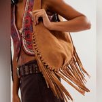 Free People  Riley Suede fringe bag in copper sungold without tags Photo 1