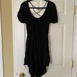 Princess Polly NWT  Black Short Sleeve Shirred Open Back Romper Photo 2