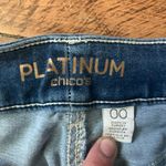 Chico's Chico’s distressed pull in medium wash 00/2 travelcore jeggings Photo 1