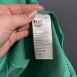 FIGS  Casma three pocket scrub top in surgical green  Photo 3