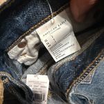 American Eagle  Outfitters | Ripped Dark Blue 90s boyfriend Jean shorts size 2 Photo 1