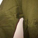 Something, Somewhere Olive Green Cropped Peplum Sweatshirt Photo 4