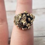 Vintage Sarah Coventry Adjustable Ring Gold Tone with Black, Leaves & Berries Photo 0