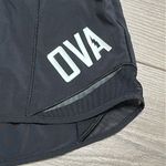 Lululemon Hotty Hot Short 4" Black Running Shorts OVA Logo Size 4 Tall Photo 4