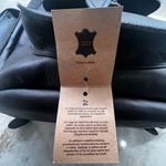 Sleek Black Leather Backpack Photo 2