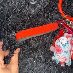 Handmade Vibrant Red Keychain‎ Set with Floral Pouch Photo 1