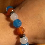 Red, White, and Blue Agate And Hematite Stainless Steel Bracelet Photo 9