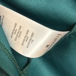 Francesca's Audrey parks Francesca’s Kelly Ruched Lurex Dot Dress in green size medium Photo 12