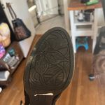 Unlisted Stiletto with button down sides. Black suede and patten leather Photo 4