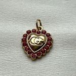 Gucci  zipperP.  shape of a heart with pink border line Photo 0