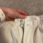 Princess Polly white high waisted denim shorts with the elastic waistband Photo 3